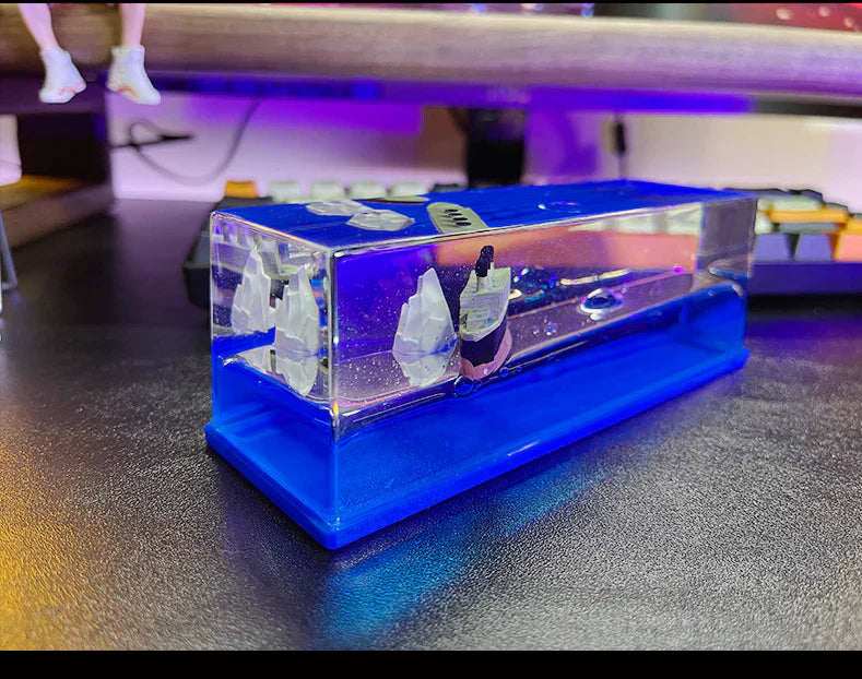 Home Decor decorative crystal display piece with blue base and miniature elements.